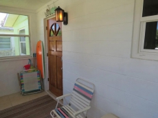 Pet Friendly 2 bedroom 2 bath home with large fenced yard only a short walk to beach.