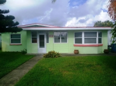 Pet Friendly 2 bedroom 2 bath home with large fenced yard only a short walk to beach.