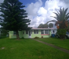 Pet Friendly 2 bedroom 2 bath home with large fenced yard only a short walk to beach.