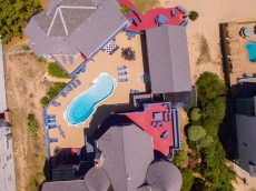 3 Buildings form a courtyard around pool