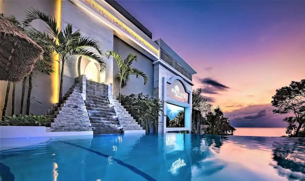 Villa rental in Cozumel - 250' Waterslide, 3 Theaters, 2 Hot Tubs,  Ocean-Front Infinity Pool, Swim-up Bars