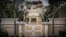 GATED COMPLEX WITH MULTIPLE BUILDINGS THAT OVERLOOK EACH OTHER TO THE OCEAN.