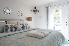 STUNNING HOME WITH SPA, FRONT AND BACK YARD, HUGE DECK, OUTSTANDING LOCATION