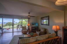 Beautiful Ocean View One Bedroom Condo Bordering Golf Course w/AC in Bedroom!