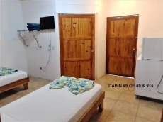 OPPISITE VIEW OF ROOM #9 (LEFT DOOR IS BATHROOM AND RIGHT DOOR IS ETRY)F