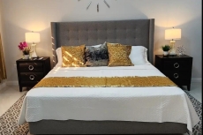 Bedroom 1, King bed, Ensuite bathroom, large closet, AC, ceiling fan, Smart TV, safe, USB charger touch lamps