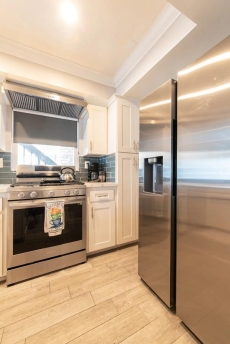 Steps to Sand/Lower Unit 3 bedroom/2 bath unit wit