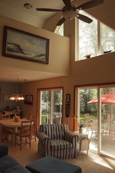 Open living area with vaulted ceiling