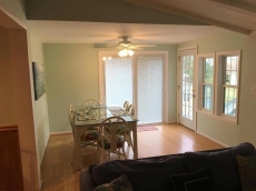 5 bedrooms, two golf carts, 4 bathrooms, linens ,post stay cleaning included