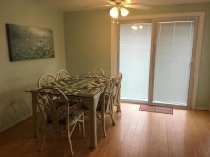 5 bedrooms, two golf carts, 4 bathrooms, linens ,post stay cleaning included