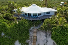 Tropical vegetation surrounds the unique house offering panoramic views form all areas.