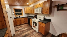 Bass Lk~Sand Beach~1.68Wooded Acres~Sleeps 6-8~1.5 Bath