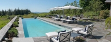Pool with Tuuci umbrella provides ample shade, looking south to the Atlantic.