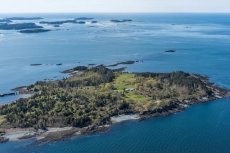Looking south, house/guest house in center, dock on left