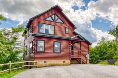 Front of cabin with parking space