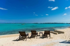 Luxury 5 bedroom home on the water, with private pool and use of automobile