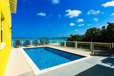 Luxury 5 bedroom home on the water, with private pool and use of automobile