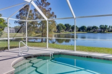 Lake View Villa With Private Heated South Facing Pool in popular Beachwalk Isles