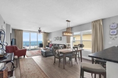 Open concept living room, dining and kitchen.