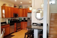 Kitchen and stairs to bedrooms