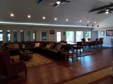 Lake Diane Luxury Estate on 2 acres with Indoor Pool, large family friendly, beautiful sand beach on 300ft shore, Large Pavilion, Firepit, 2 docks, kayaks, Paddle boat, Pontoon, Jetskies.   