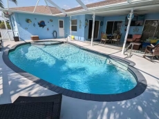 Calypso Cove Waterfront Oasis w Pool & Spa