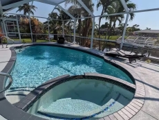 Calypso Cove Waterfront Oasis w Pool & Spa