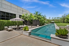 Outdoor heated pool with sitting area