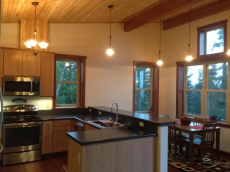 The open kitchen allows you to visit with others and enjoy the wonderful view