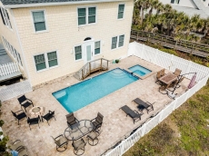 View from beach of pool/hot tub/fire pit