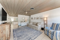 Chasing Waves. Seconds to the sand! West of Gulf Drive Dog Friendly