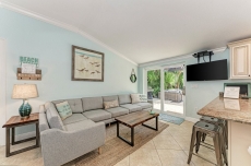 Beach Bliss. Blocks to the white sand beaches with a backyard oasis that