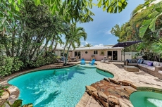 Beach Bliss. Blocks to the white sand beaches with a backyard oasis that