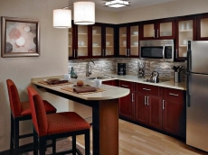 Outdoor Pool + Business Center, Free Breakfast | Fully Equipped Suite