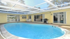 house built around pool